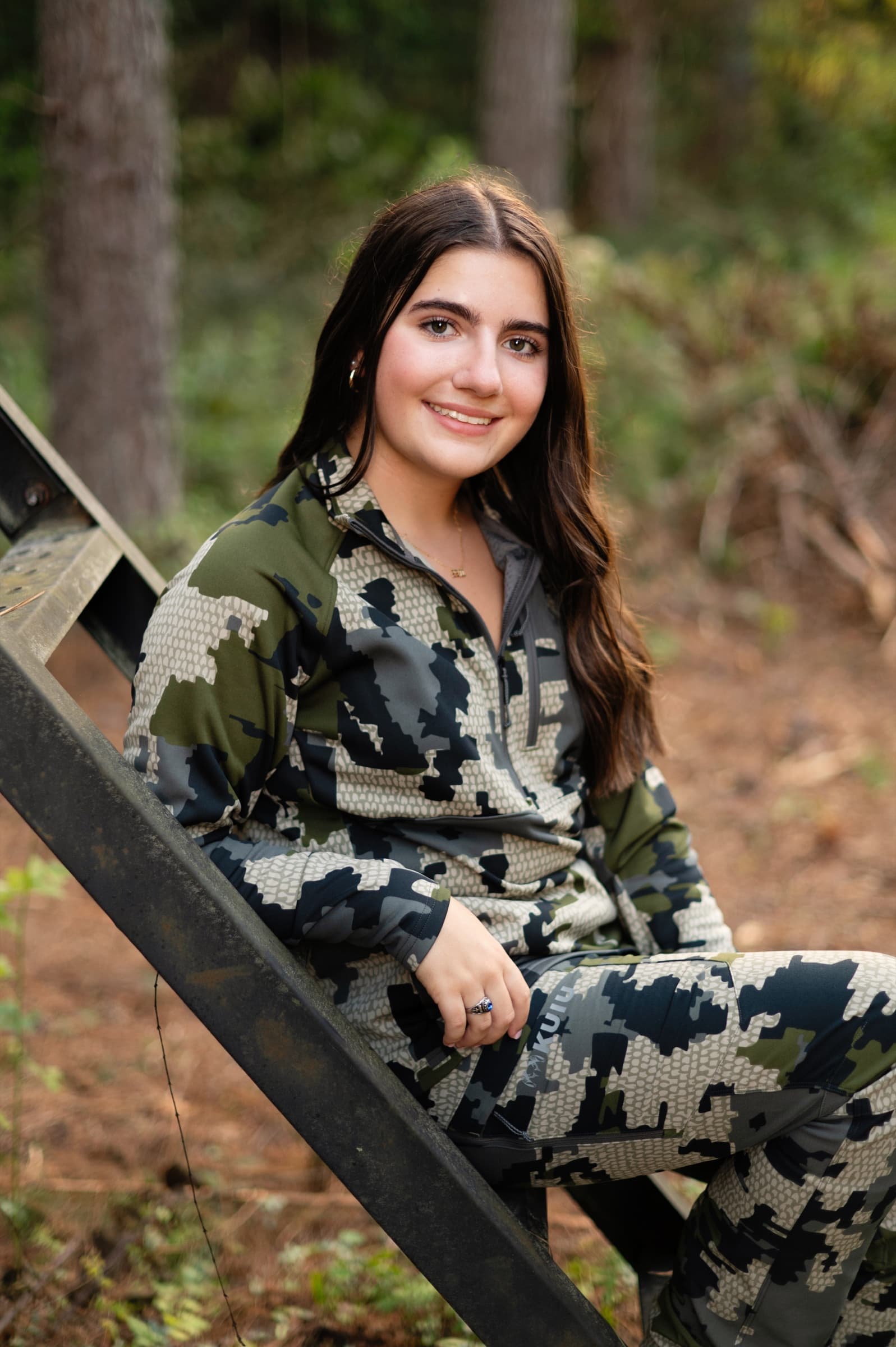 Senior portrait with a creative outdoor setting