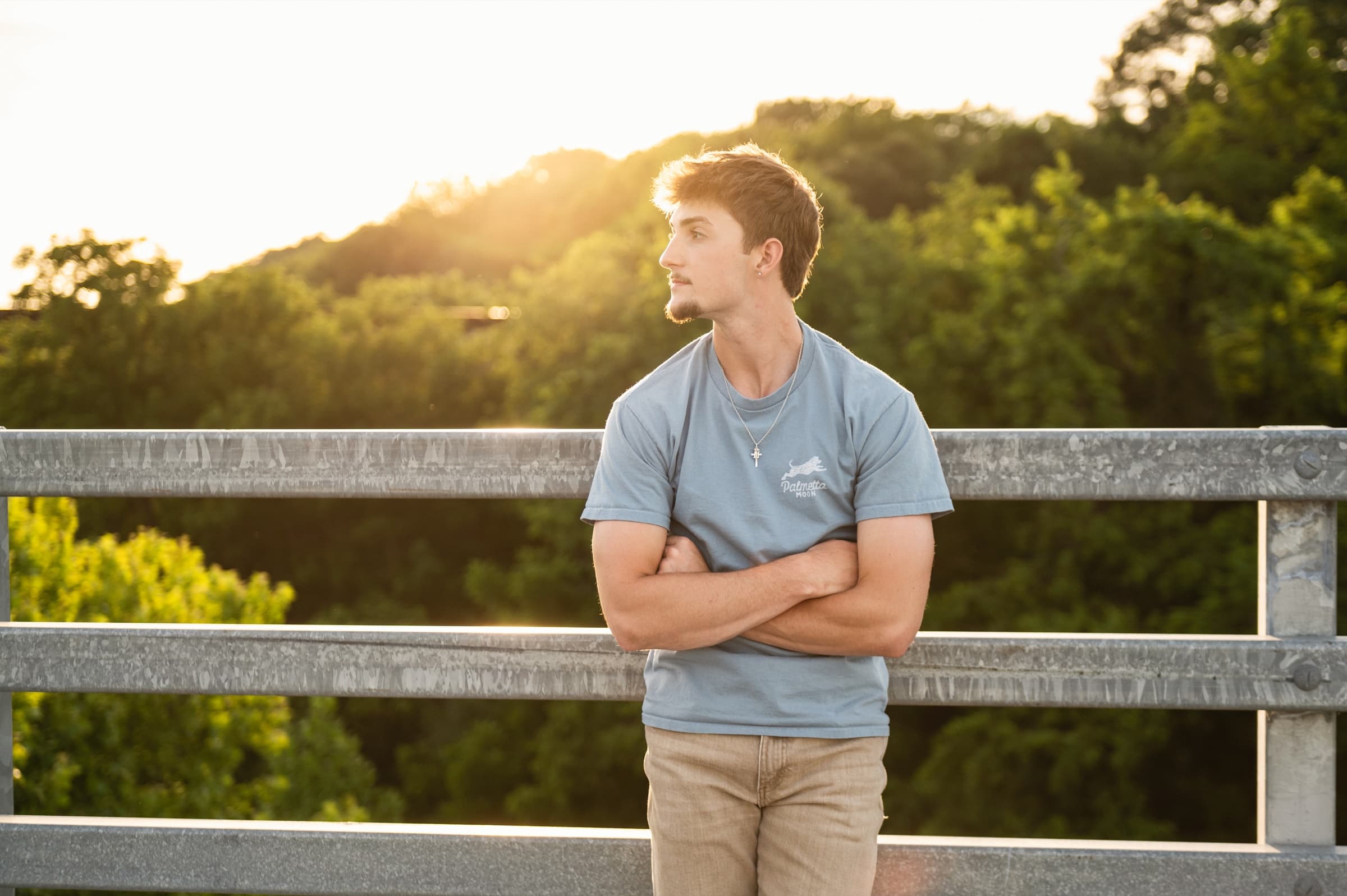 Senior boy portrait at sunset