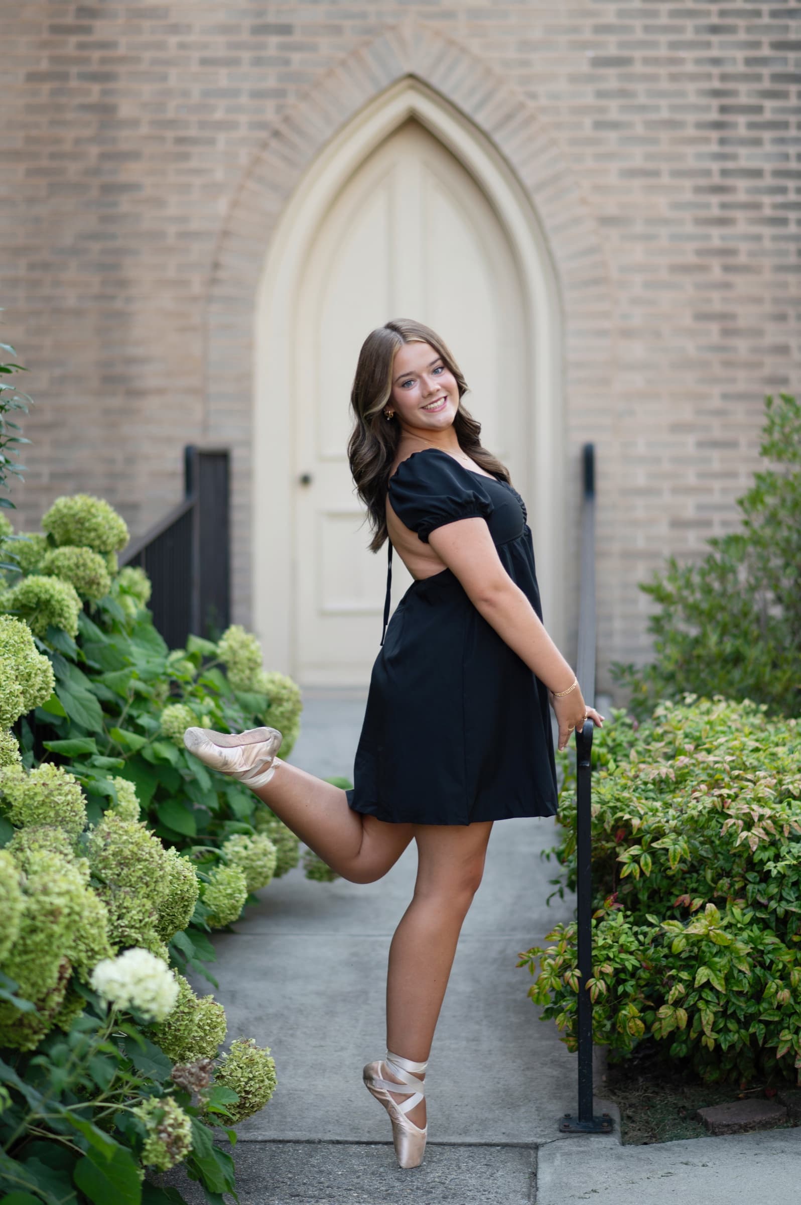 Senior portrait in a garden setting