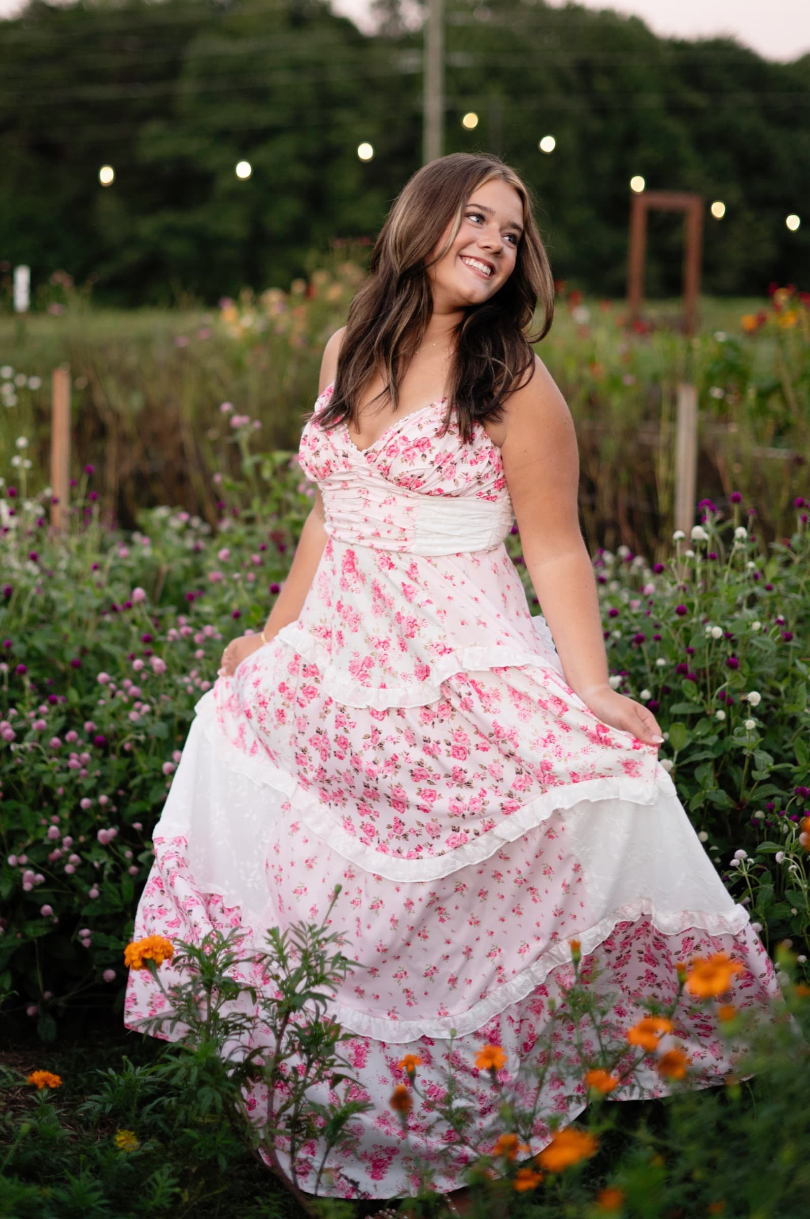 Senior portrait in a flowing floral dress