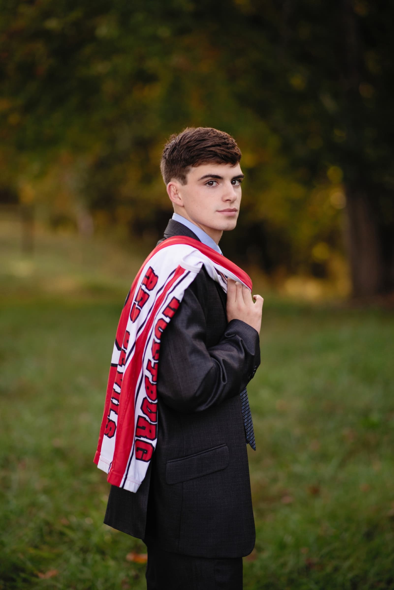 Senior athlete portrait with a letterman jacket