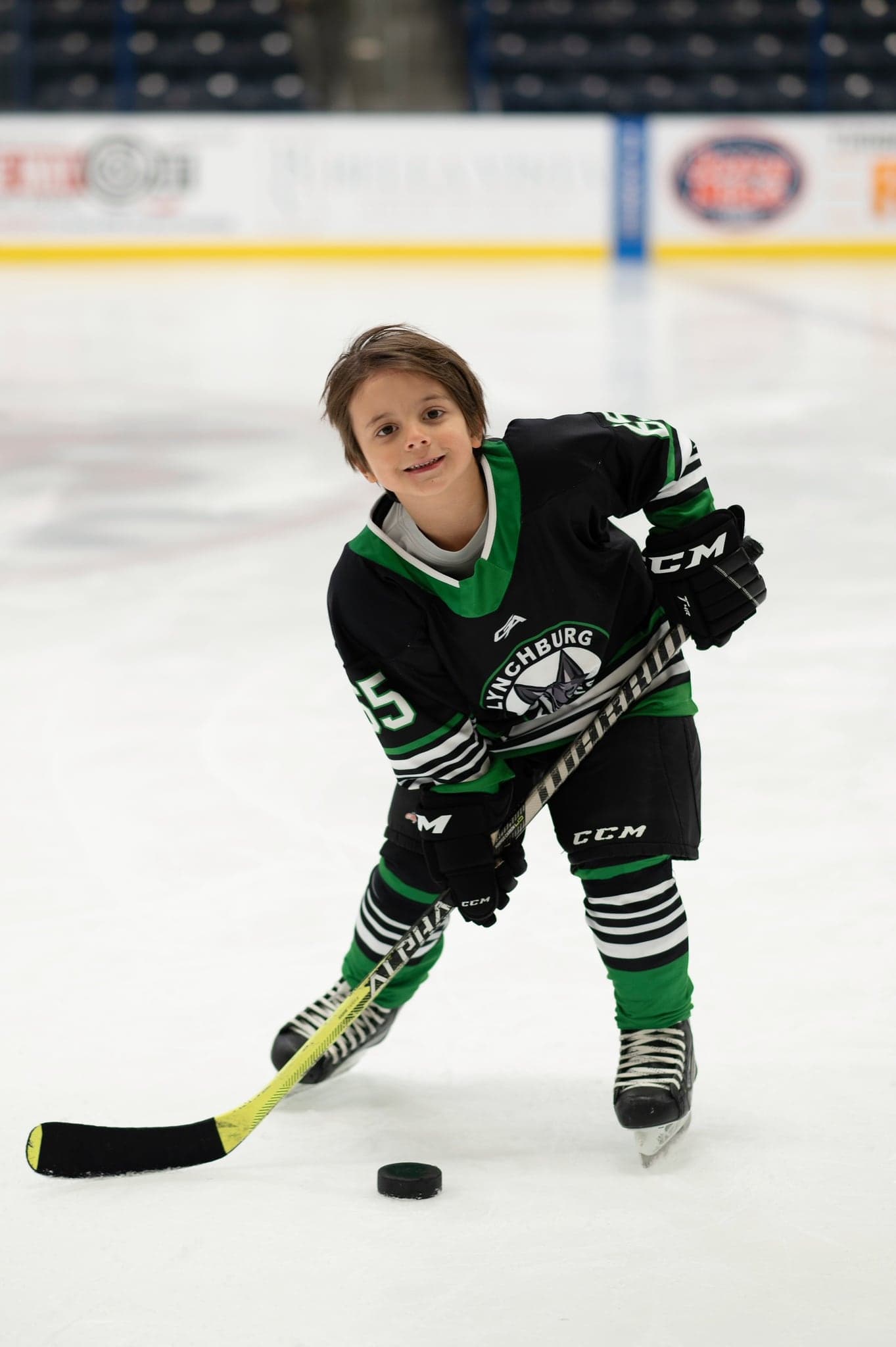 Coyotes player in skating stance at the rink
